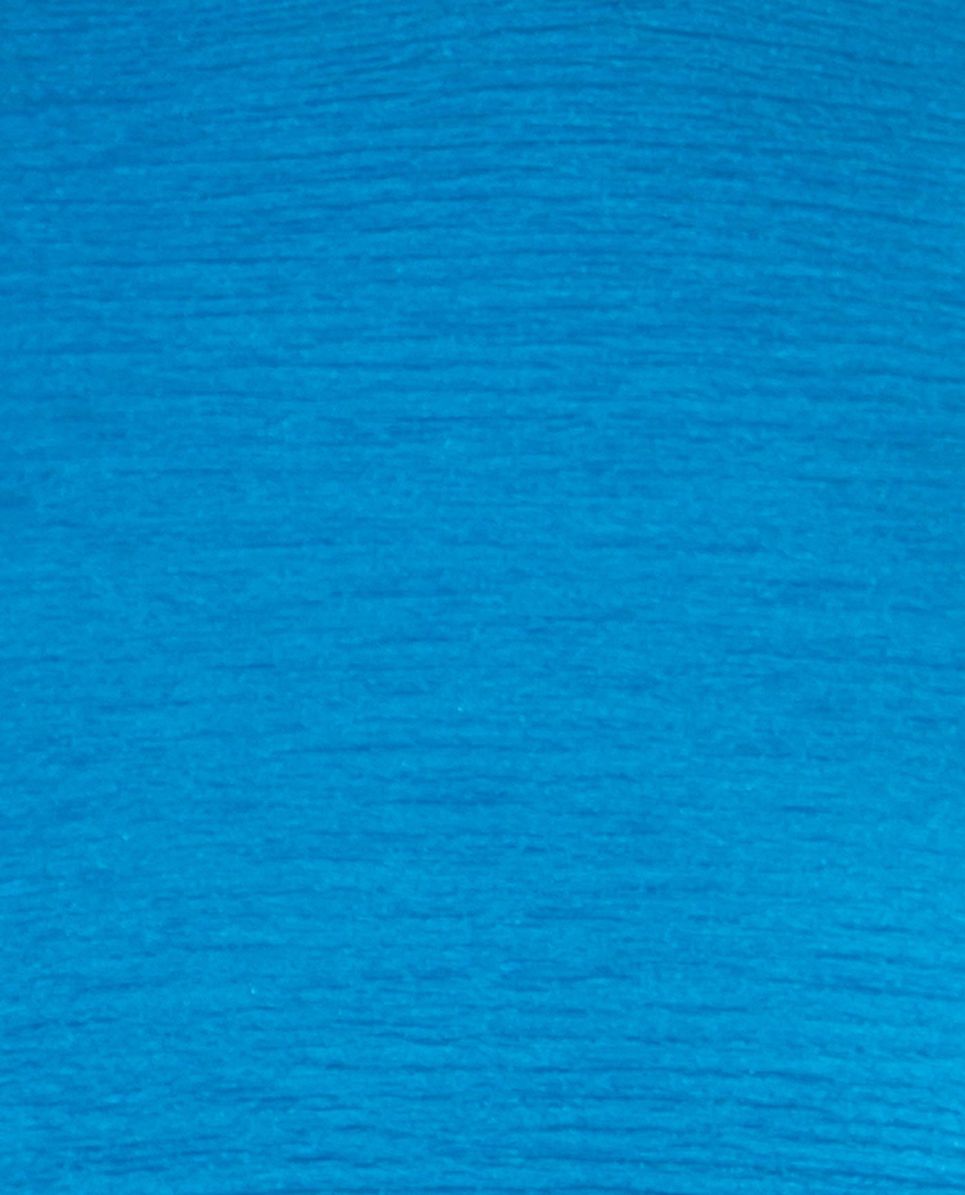 FABRIC DETAIL OF CHLORINE RESISTANT KRINKLE TEXTURED SOLID CROSS BACK LONG TORSO ONE PIECE | KRINKLE MINERAL