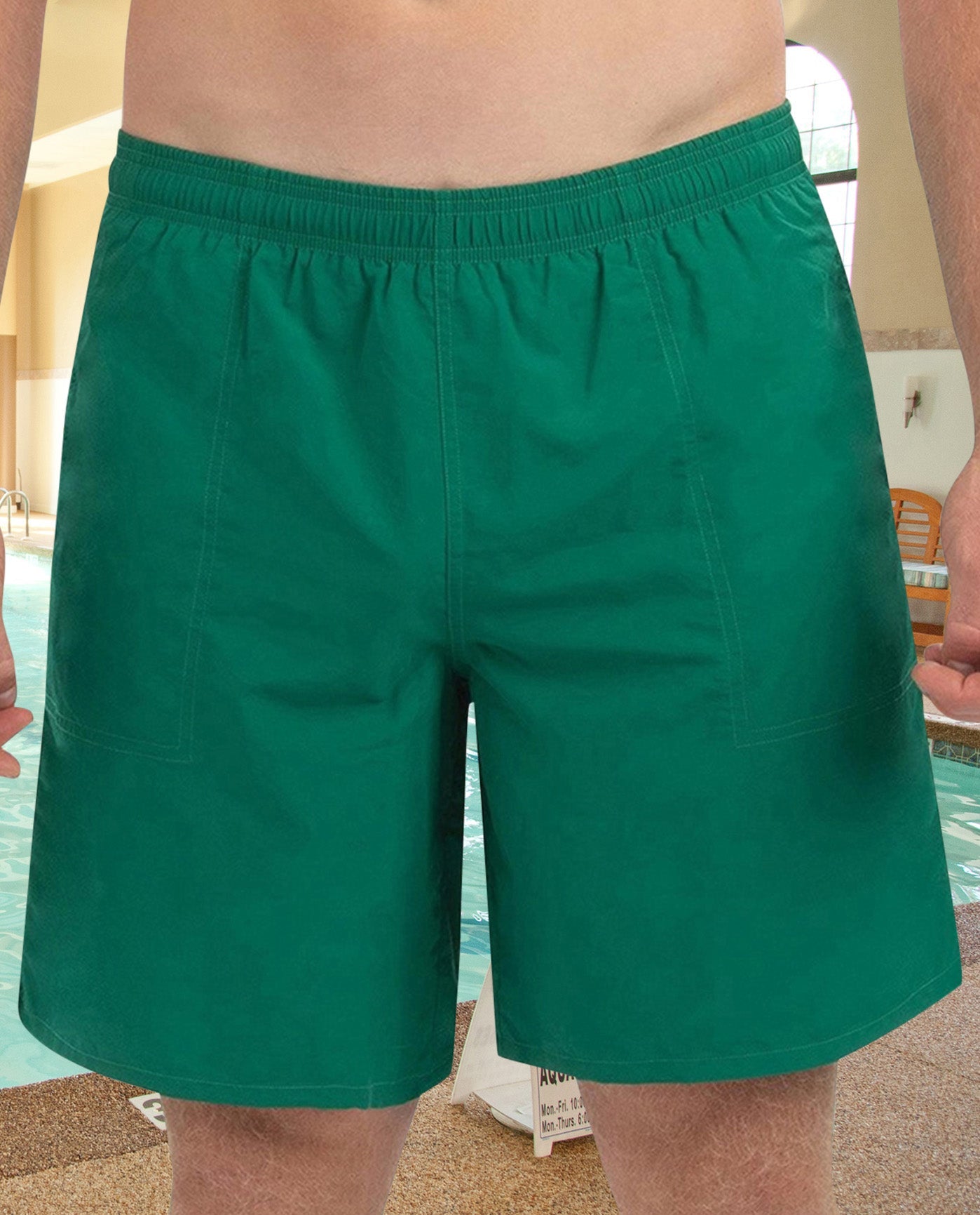 Front View Of CHLORINE RESISTANT DOLFIN SOLID 9 INCH MENS SWIM TRUNKS | 560 DOLFIN GREEN