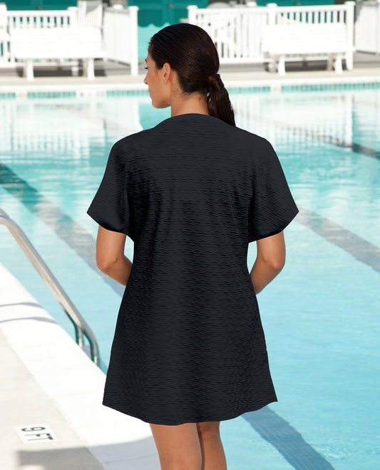 BACK VIEW OF AQUAMORE SOLID TEXTURED CAP SLEEVE BUTTON UP COVER UP TUNIC | 017 AQM TEXTURED BLACK