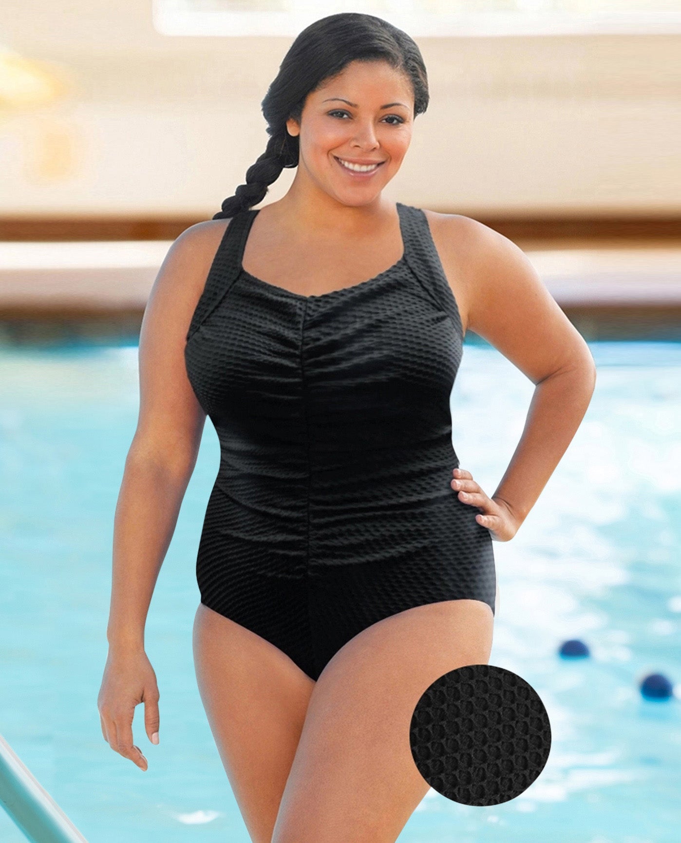 FRONT VIEW OF CHLORINE RESISTANT AQUAMORE SOLID TEXTURED SHIRRED FRONT PLUS SIZE SWIMSUIT | 502 AQT TEXTURED BLACK